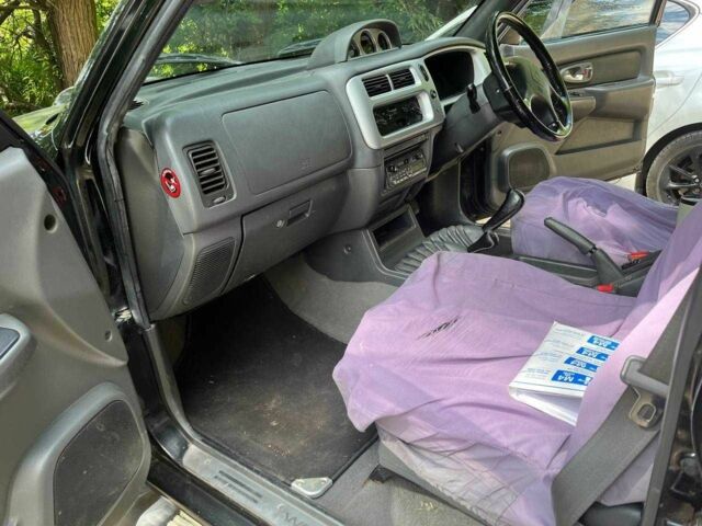 Черный Мицубиси Л 200, объемом двигателя 0 л и пробегом 150 тыс. км за 4667 $, фото 13 на Automoto.ua