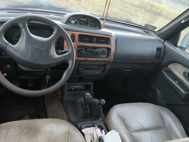 Черный Мицубиси Л 200, объемом двигателя 0 л и пробегом 150 тыс. км за 4667 $, фото 19 на Automoto.ua