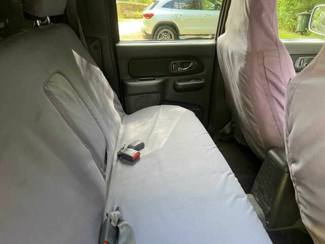 Черный Мицубиси Л 200, объемом двигателя 0 л и пробегом 150 тыс. км за 4667 $, фото 14 на Automoto.ua