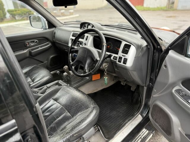 Чорний Міцубісі Л 200, об'ємом двигуна 0 л та пробігом 200 тис. км за 4600 $, фото 6 на Automoto.ua