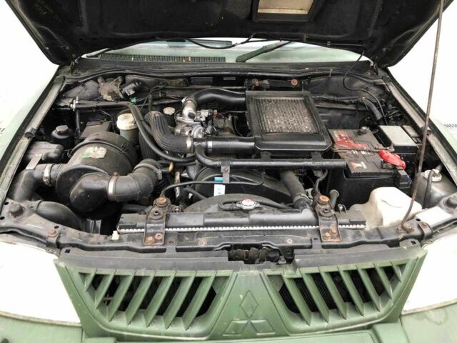 Мицубиси Л 200 2004 в Киеве на Automoto.ua Черный Мицубиси Л 200, объемом двигателя 2.5 л и пробегом 190 тыс. км за 8000 $, фото 9 на Automoto.ua