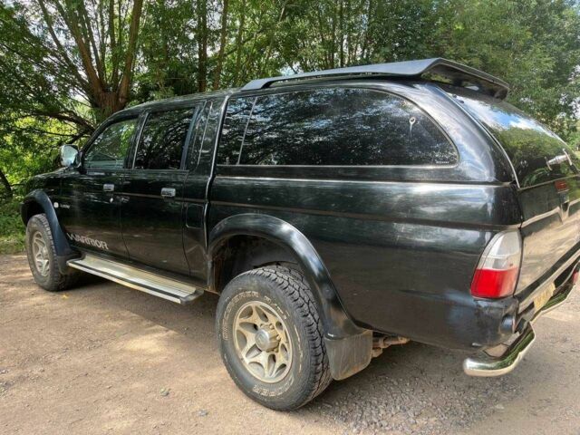 Черный Мицубиси Л 200, объемом двигателя 0 л и пробегом 150 тыс. км за 4667 $, фото 8 на Automoto.ua