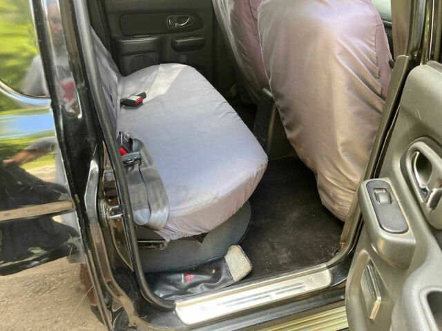 Черный Мицубиси Л 200, объемом двигателя 0 л и пробегом 150 тыс. км за 4667 $, фото 4 на Automoto.ua