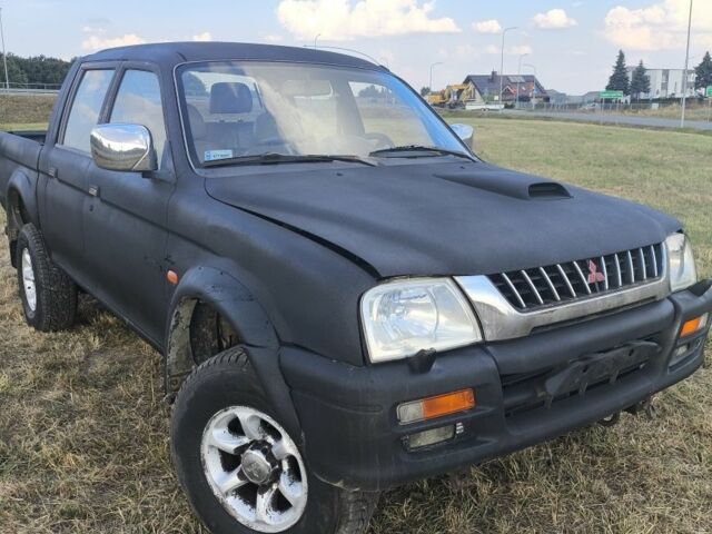 Черный Мицубиси Л 200, объемом двигателя 0 л и пробегом 150 тыс. км за 4667 $, фото 16 на Automoto.ua