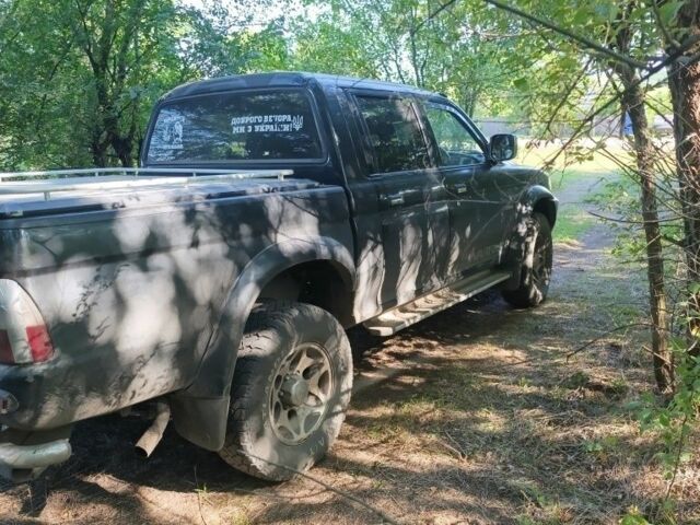 Чорний Міцубісі Л 200, об'ємом двигуна 2.5 л та пробігом 150 тис. км за 4800 $, фото 4 на Automoto.ua