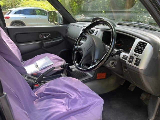 Черный Мицубиси Л 200, объемом двигателя 0 л и пробегом 150 тыс. км за 4667 $, фото 3 на Automoto.ua