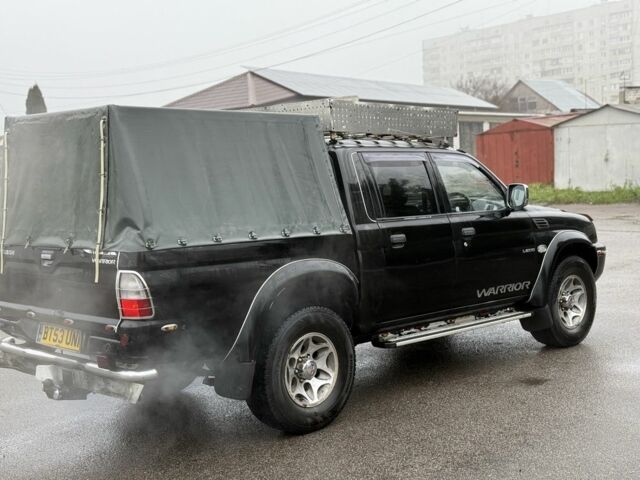 Чорний Міцубісі Л 200, об'ємом двигуна 0 л та пробігом 200 тис. км за 4600 $, фото 1 на Automoto.ua