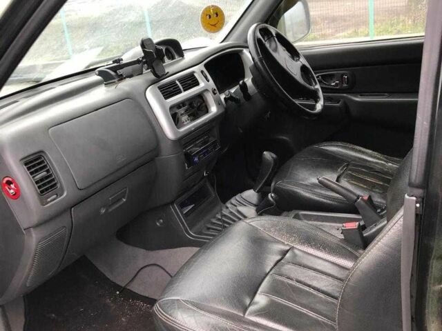 Мицубиси Л 200 2004 в Киеве на Automoto.ua Черный Мицубиси Л 200, объемом двигателя 2.5 л и пробегом 190 тыс. км за 8000 $, фото 7 на Automoto.ua