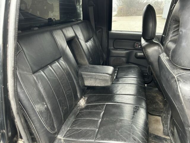 Черный Мицубиси Л 200, объемом двигателя 2.5 л и пробегом 170 тыс. км за 4250 $, фото 9 на Automoto.ua