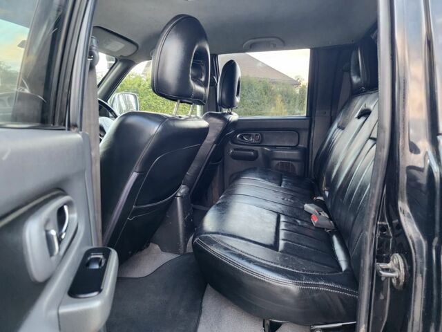 Черный Мицубиси Л 200, объемом двигателя 2.5 л и пробегом 156 тыс. км за 7521 $, фото 18 на Automoto.ua