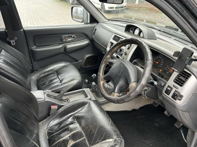 Черный Мицубиси Л 200, объемом двигателя 2.5 л и пробегом 170 тыс. км за 4250 $, фото 8 на Automoto.ua