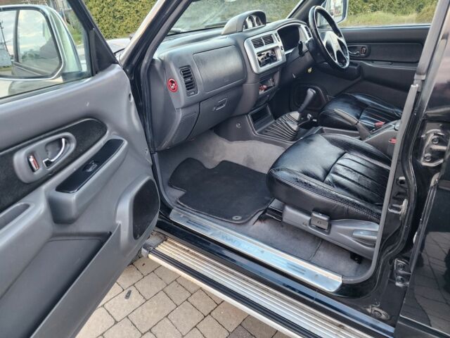 Черный Мицубиси Л 200, объемом двигателя 2.5 л и пробегом 156 тыс. км за 7521 $, фото 16 на Automoto.ua