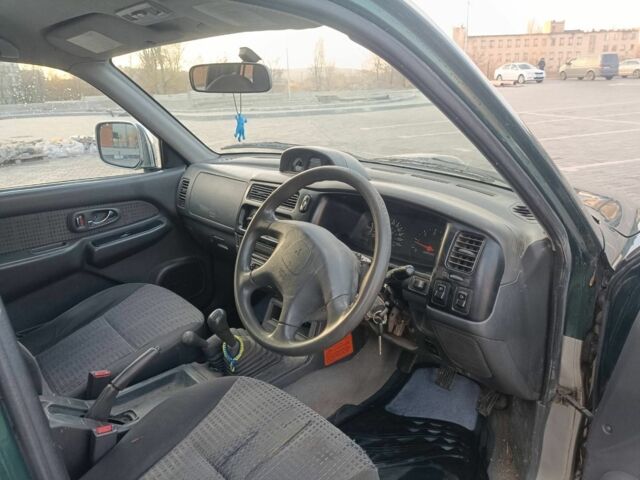 Черный Мицубиси Л 200, объемом двигателя 2.5 л и пробегом 300 тыс. км за 5100 $, фото 5 на Automoto.ua