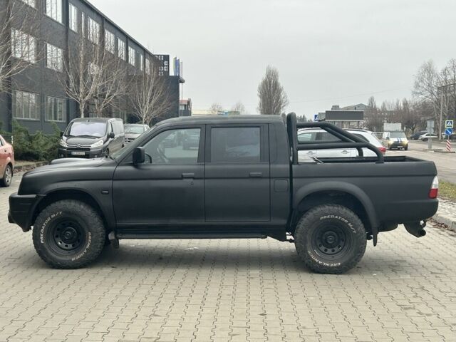 Чорний Міцубісі Л 200, об'ємом двигуна 2.5 л та пробігом 150 тис. км за 4250 $, фото 5 на Automoto.ua