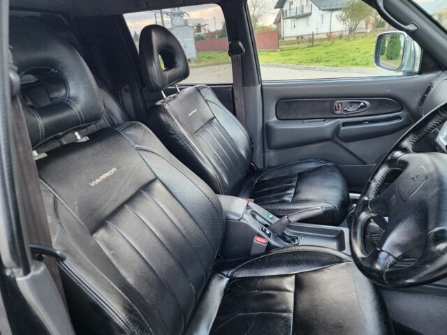 Черный Мицубиси Л 200, объемом двигателя 2.5 л и пробегом 156 тыс. км за 7521 $, фото 13 на Automoto.ua