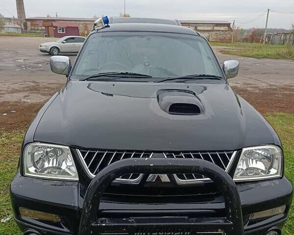 Чорний Міцубісі Л 200, об'ємом двигуна 2.5 л та пробігом 300 тис. км за 4200 $, фото 3 на Automoto.ua