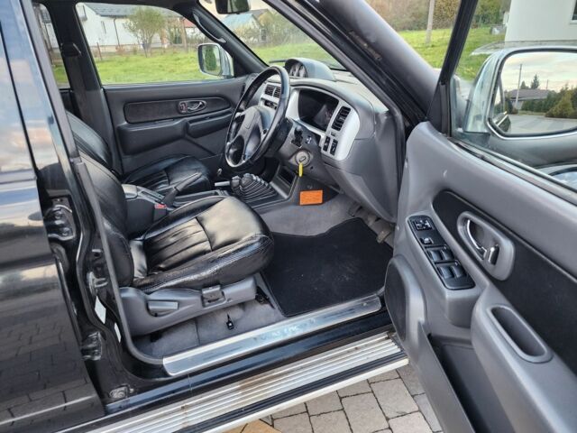 Черный Мицубиси Л 200, объемом двигателя 2.5 л и пробегом 156 тыс. км за 7521 $, фото 11 на Automoto.ua