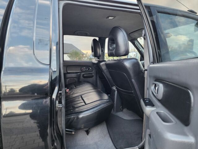 Черный Мицубиси Л 200, объемом двигателя 2.5 л и пробегом 156 тыс. км за 7521 $, фото 19 на Automoto.ua