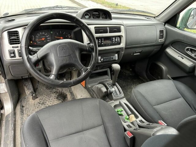 Черный Мицубиси Л 200, объемом двигателя 2.5 л и пробегом 250 тыс. км за 4250 $, фото 10 на Automoto.ua