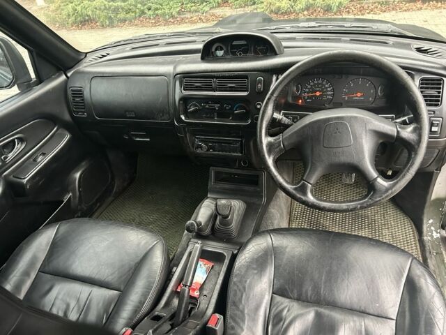 Чорний Міцубісі Л 200, об'ємом двигуна 2.5 л та пробігом 150 тис. км за 4250 $, фото 10 на Automoto.ua