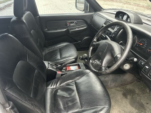 Чорний Міцубісі Л 200, об'ємом двигуна 2.5 л та пробігом 150 тис. км за 4250 $, фото 8 на Automoto.ua