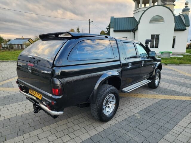 Черный Мицубиси Л 200, объемом двигателя 2.5 л и пробегом 156 тыс. км за 7521 $, фото 10 на Automoto.ua