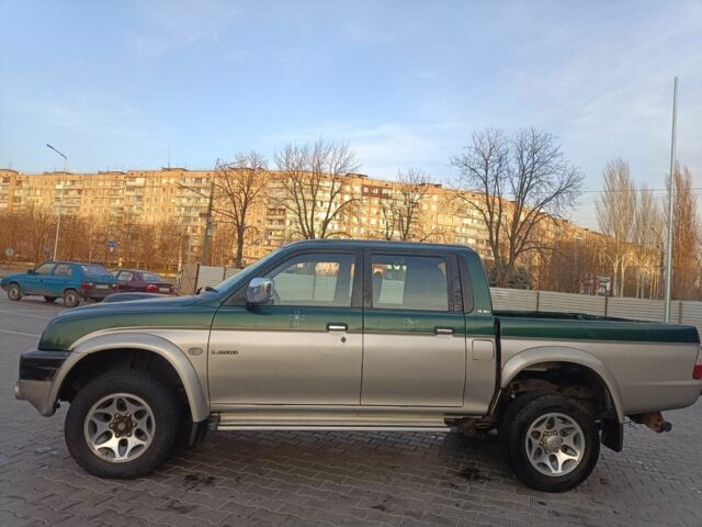 Черный Мицубиси Л 200, объемом двигателя 2.5 л и пробегом 300 тыс. км за 5100 $, фото 4 на Automoto.ua