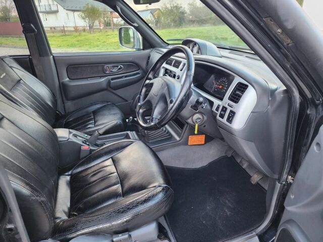 Черный Мицубиси Л 200, объемом двигателя 2.5 л и пробегом 156 тыс. км за 7521 $, фото 12 на Automoto.ua