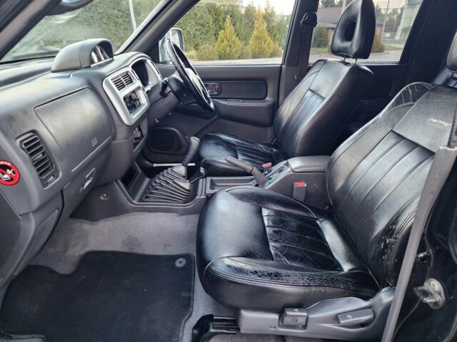 Черный Мицубиси Л 200, объемом двигателя 2.5 л и пробегом 156 тыс. км за 7521 $, фото 17 на Automoto.ua