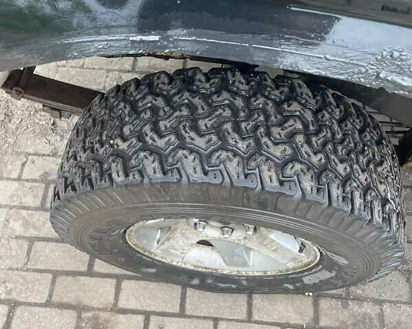 Черный Мицубиси Л 200, объемом двигателя 2.5 л и пробегом 350 тыс. км за 5000 $, фото 4 на Automoto.ua