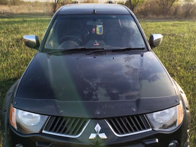 Черный Мицубиси Л 200, объемом двигателя 0 л и пробегом 160 тыс. км за 7578 $, фото 4 на Automoto.ua