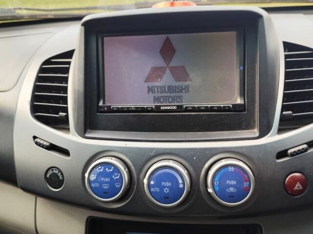 Черный Мицубиси Л 200, объемом двигателя 0 л и пробегом 160 тыс. км за 7578 $, фото 7 на Automoto.ua