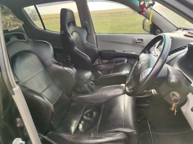 Черный Мицубиси Л 200, объемом двигателя 0 л и пробегом 163 тыс. км за 8057 $, фото 9 на Automoto.ua