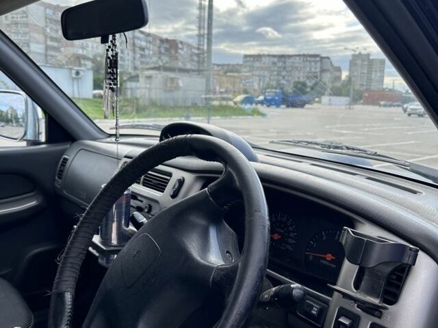 Чорний Міцубісі Л 200, об'ємом двигуна 2.5 л та пробігом 170 тис. км за 6100 $, фото 4 на Automoto.ua
