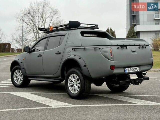 Черный Мицубиси Л 200, объемом двигателя 2.48 л и пробегом 232 тыс. км за 13900 $, фото 9 на Automoto.ua