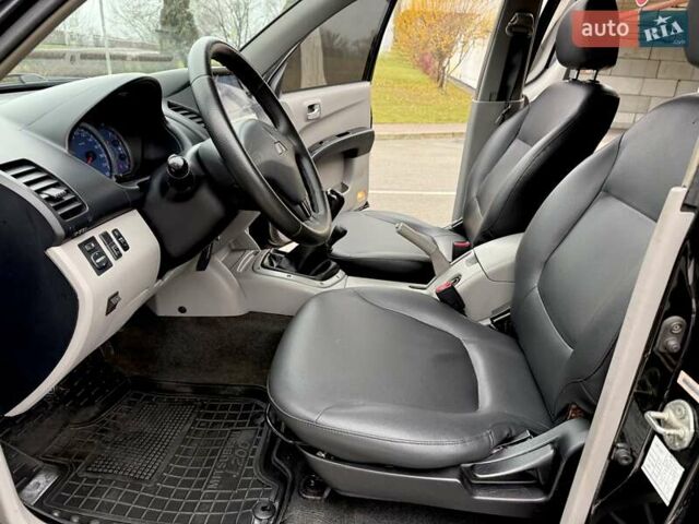 Черный Мицубиси Л 200, объемом двигателя 2.48 л и пробегом 232 тыс. км за 13900 $, фото 55 на Automoto.ua