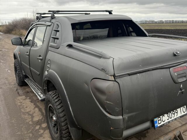 Чорний Міцубісі Л 200, об'ємом двигуна 2.5 л та пробігом 500 тис. км за 9300 $, фото 7 на Automoto.ua