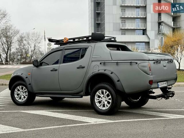 Черный Мицубиси Л 200, объемом двигателя 2.48 л и пробегом 232 тыс. км за 13900 $, фото 7 на Automoto.ua