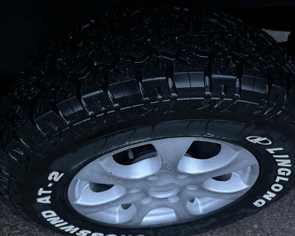 Черный Мицубиси Л 200, объемом двигателя 2.5 л и пробегом 199 тыс. км за 11800 $, фото 7 на Automoto.ua