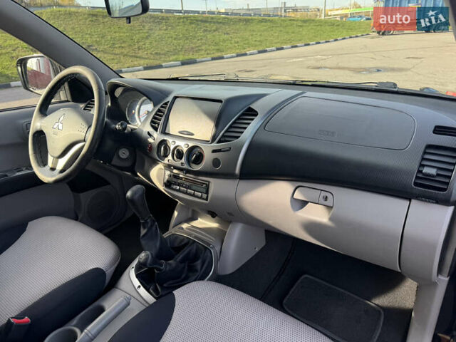 Мицубиси Л 200 2007 в Киеве на Automoto.ua Черный Мицубиси Л 200, объемом двигателя 2.48 л и пробегом 283 тыс. км за 10999 $, фото 12 на Automoto.ua