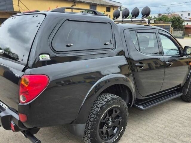 Черный Мицубиси Л 200, объемом двигателя 2.5 л и пробегом 278 тыс. км за 4200 $, фото 4 на Automoto.ua