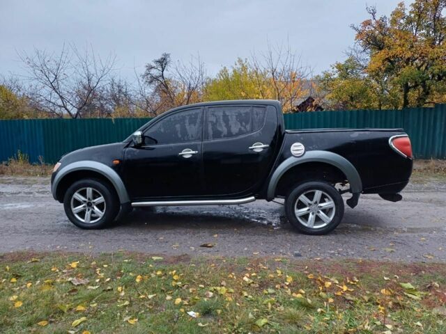 Черный Мицубиси Л 200, объемом двигателя 2.5 л и пробегом 170 тыс. км за 5900 $, фото 4 на Automoto.ua