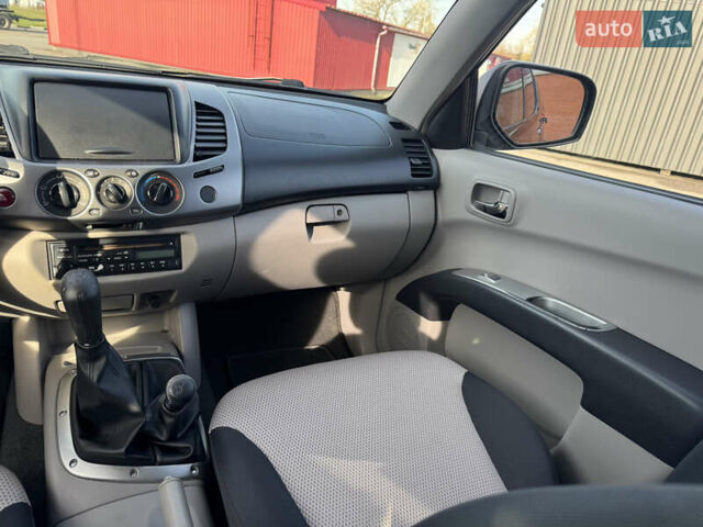 Мицубиси Л 200 2007 в Киеве на Automoto.ua Черный Мицубиси Л 200, объемом двигателя 2.48 л и пробегом 283 тыс. км за 10999 $, фото 27 на Automoto.ua