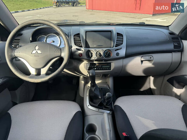 Мицубиси Л 200 2007 в Киеве на Automoto.ua Черный Мицубиси Л 200, объемом двигателя 2.48 л и пробегом 283 тыс. км за 10999 $, фото 25 на Automoto.ua