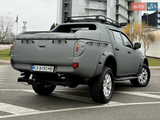 Черный Мицубиси Л 200, объемом двигателя 2.48 л и пробегом 232 тыс. км за 13900 $, фото 14 на Automoto.ua