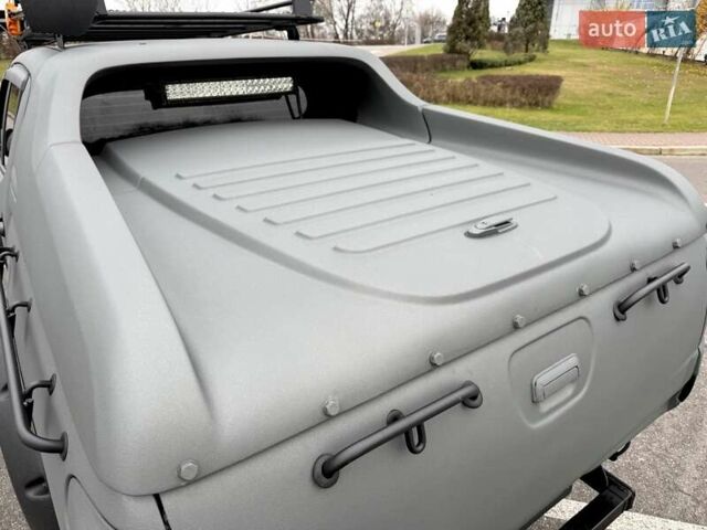 Черный Мицубиси Л 200, объемом двигателя 2.48 л и пробегом 232 тыс. км за 13900 $, фото 32 на Automoto.ua