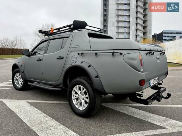 Черный Мицубиси Л 200, объемом двигателя 2.48 л и пробегом 232 тыс. км за 13900 $, фото 28 на Automoto.ua