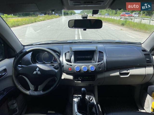 Чорний Міцубісі Л 200, об'ємом двигуна 2.48 л та пробігом 273 тис. км за 11800 $, фото 11 на Automoto.ua