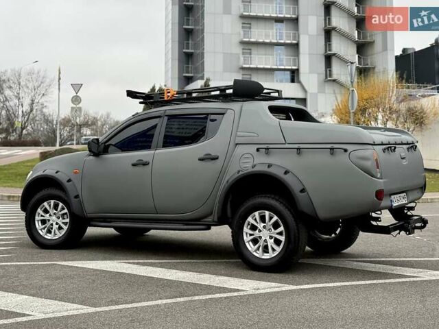 Черный Мицубиси Л 200, объемом двигателя 2.48 л и пробегом 232 тыс. км за 13900 $, фото 6 на Automoto.ua