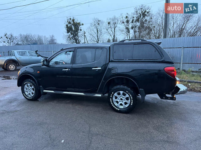Черный Мицубиси Л 200, объемом двигателя 2.5 л и пробегом 199 тыс. км за 11800 $, фото 12 на Automoto.ua